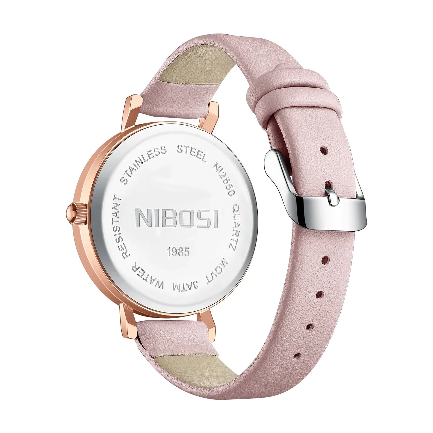 Watch with pink strap and rose gold case on a white background