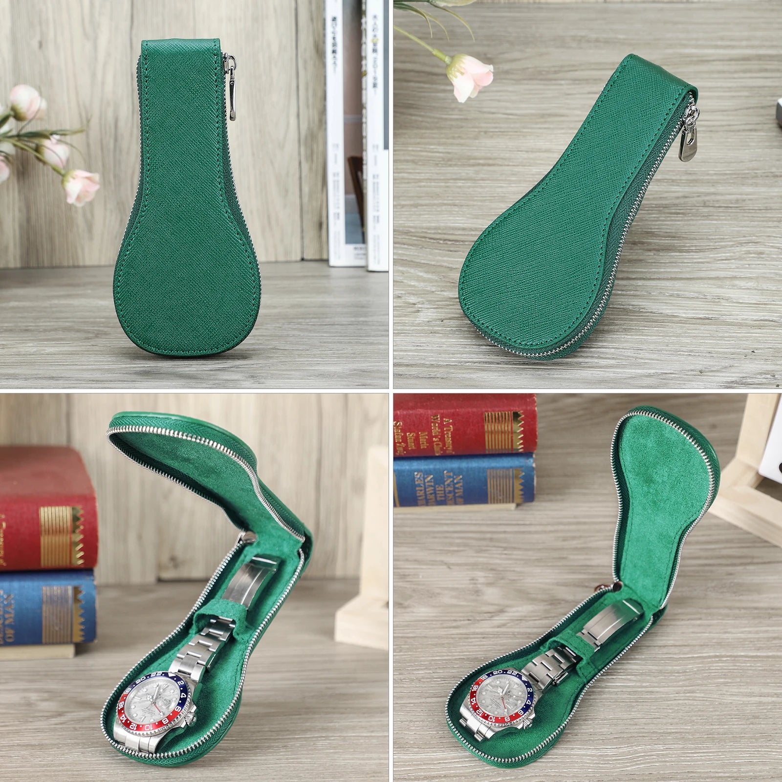 Green leather watch case with zipper on a wooden surface with books and flowers in the background.