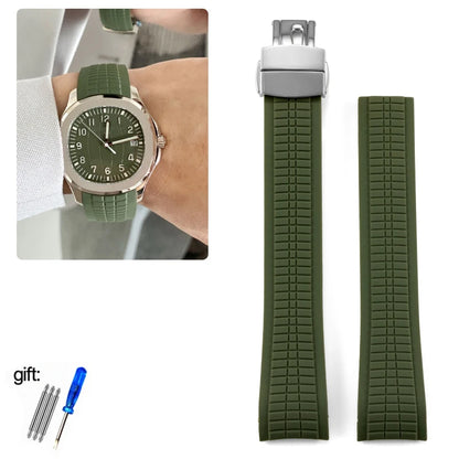 Green watch with matching strap, additional strap, and tool set on a white background