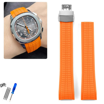 Orange watch strap with metal clasp on a white background, with a close-up inset of a watch wearing the strap.