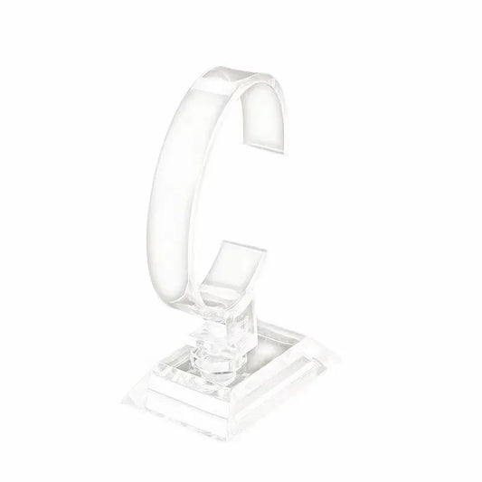 Clear glass ring holder on a white background