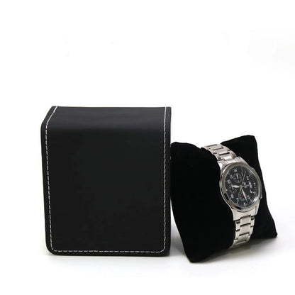 Black watch box with a silver watch on a white background