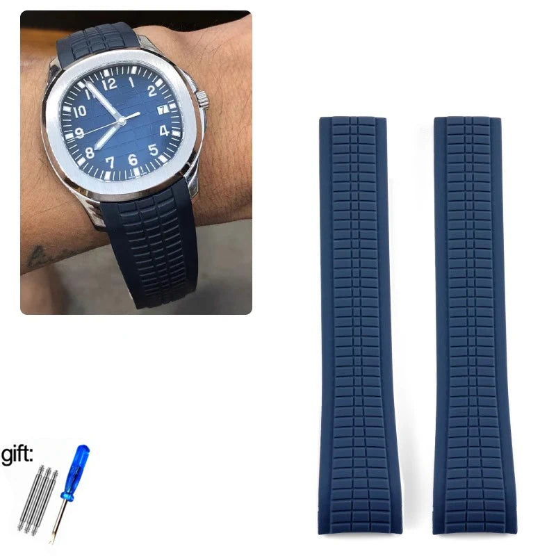 Blue watch with matching strap and tools on a white background