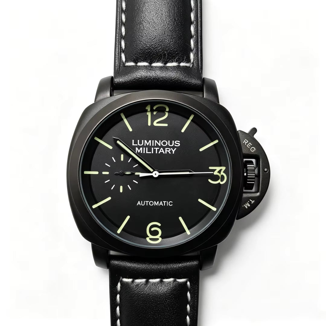A black Luminous Military Automatic watch with a black leather strap featuring white stitching, a black dial with luminous yellow Arabic numerals, and a black crown guard.