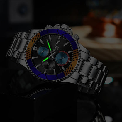 Luxury watch with a detailed face and metal band on a blurred background