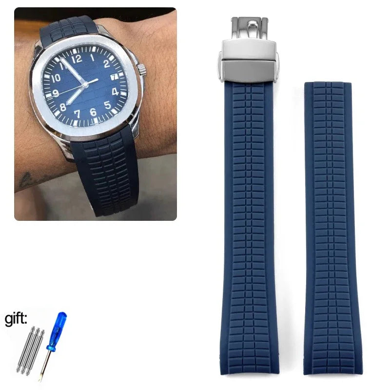 Blue watch with matching strap and tool on a white background